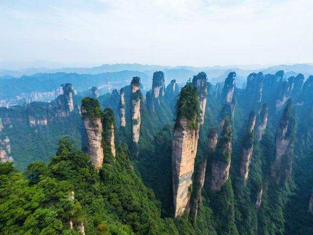 长沙到张家界游玩攻略,有哪些必去景点和美食推荐?